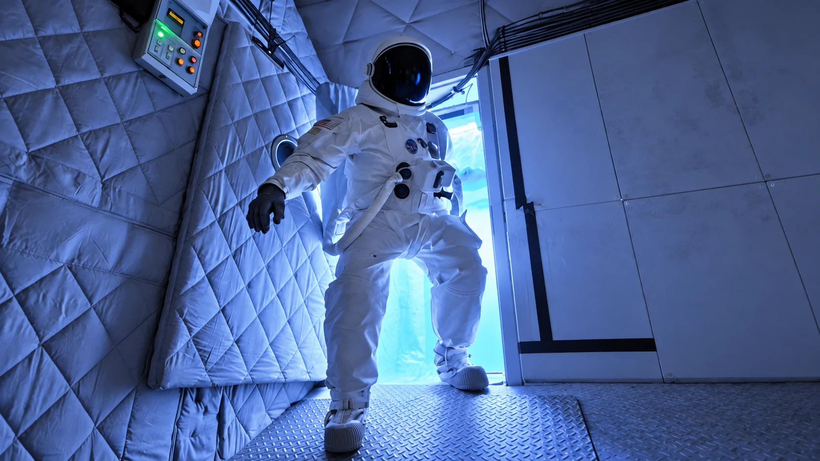 Astronaut in the padded airlock