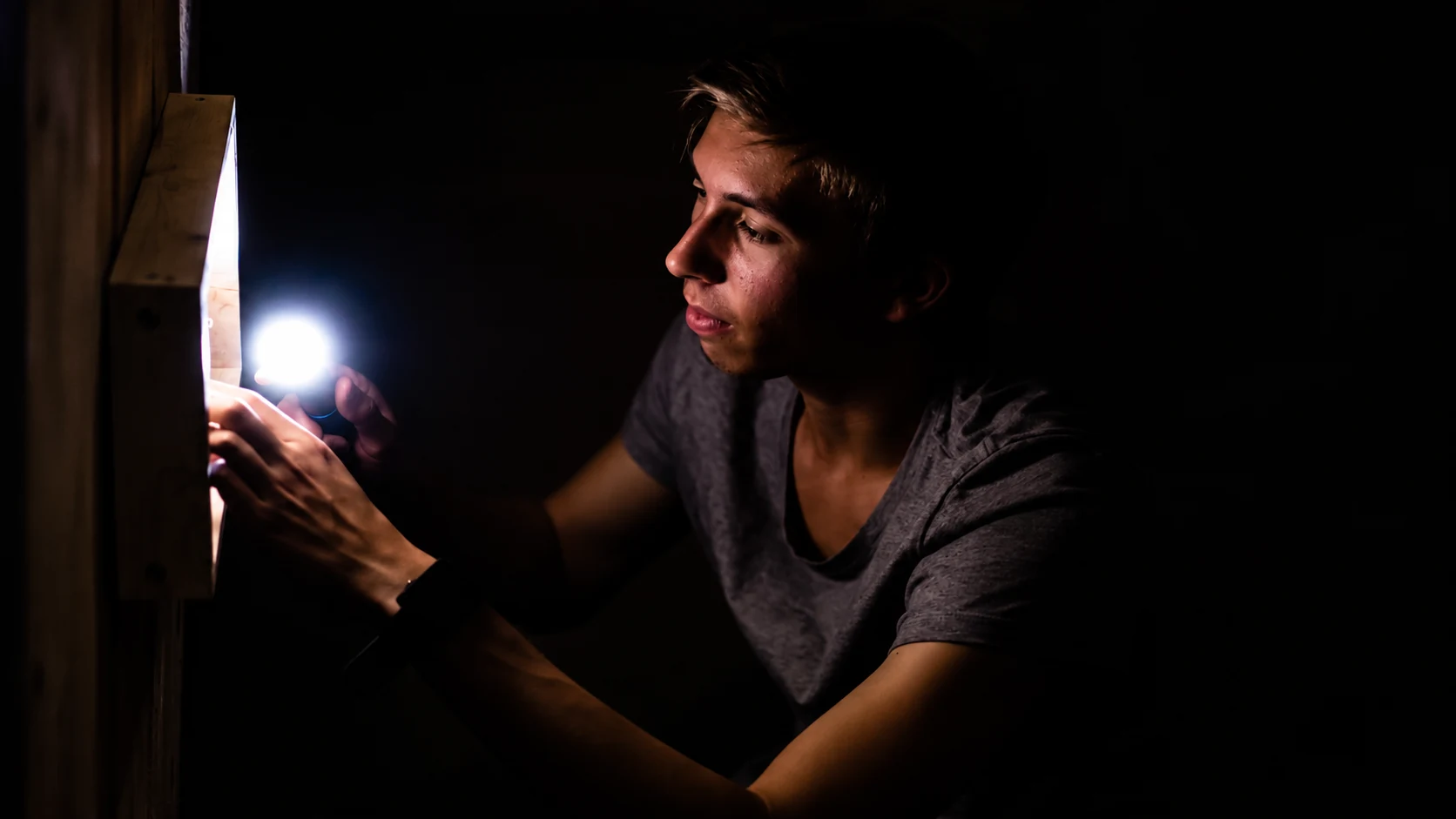 Player examining a clue with a torch